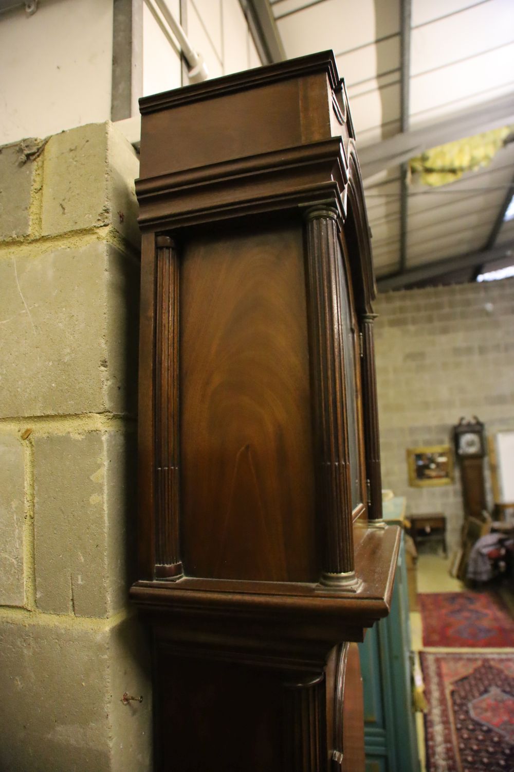 A George III longcase clock, the movement circa 1769, the London style mahogany case circa 1800, height 230cm